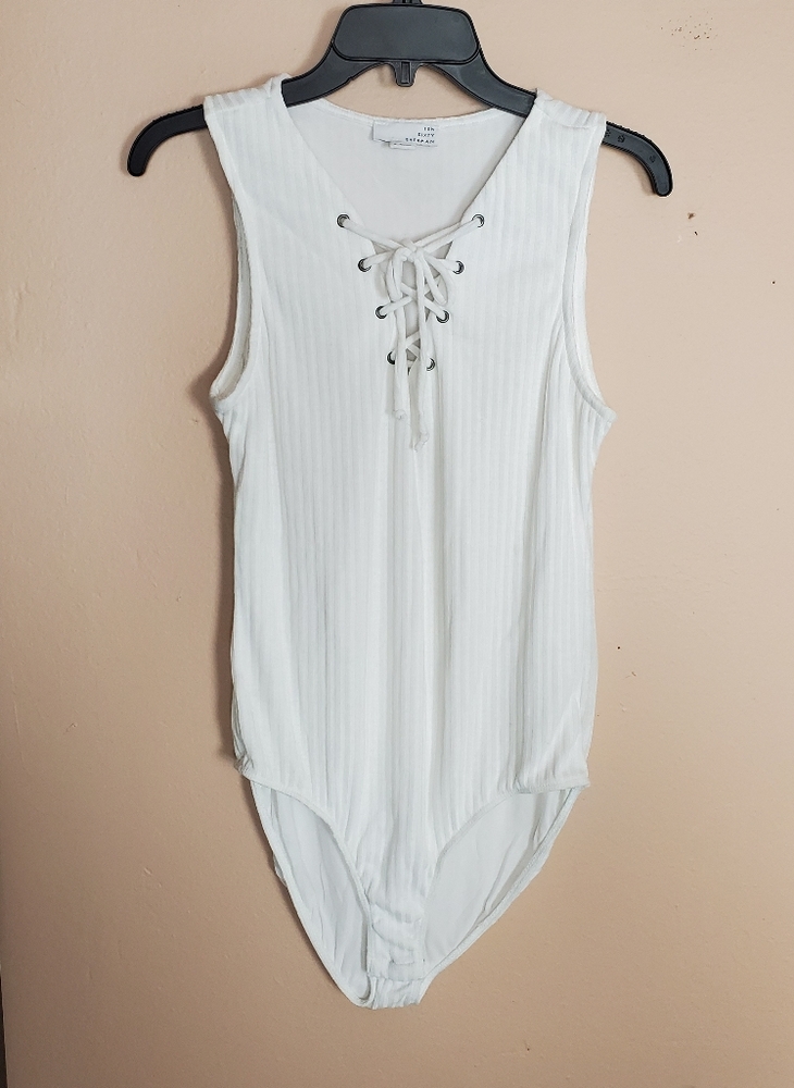 White sleveless tops
